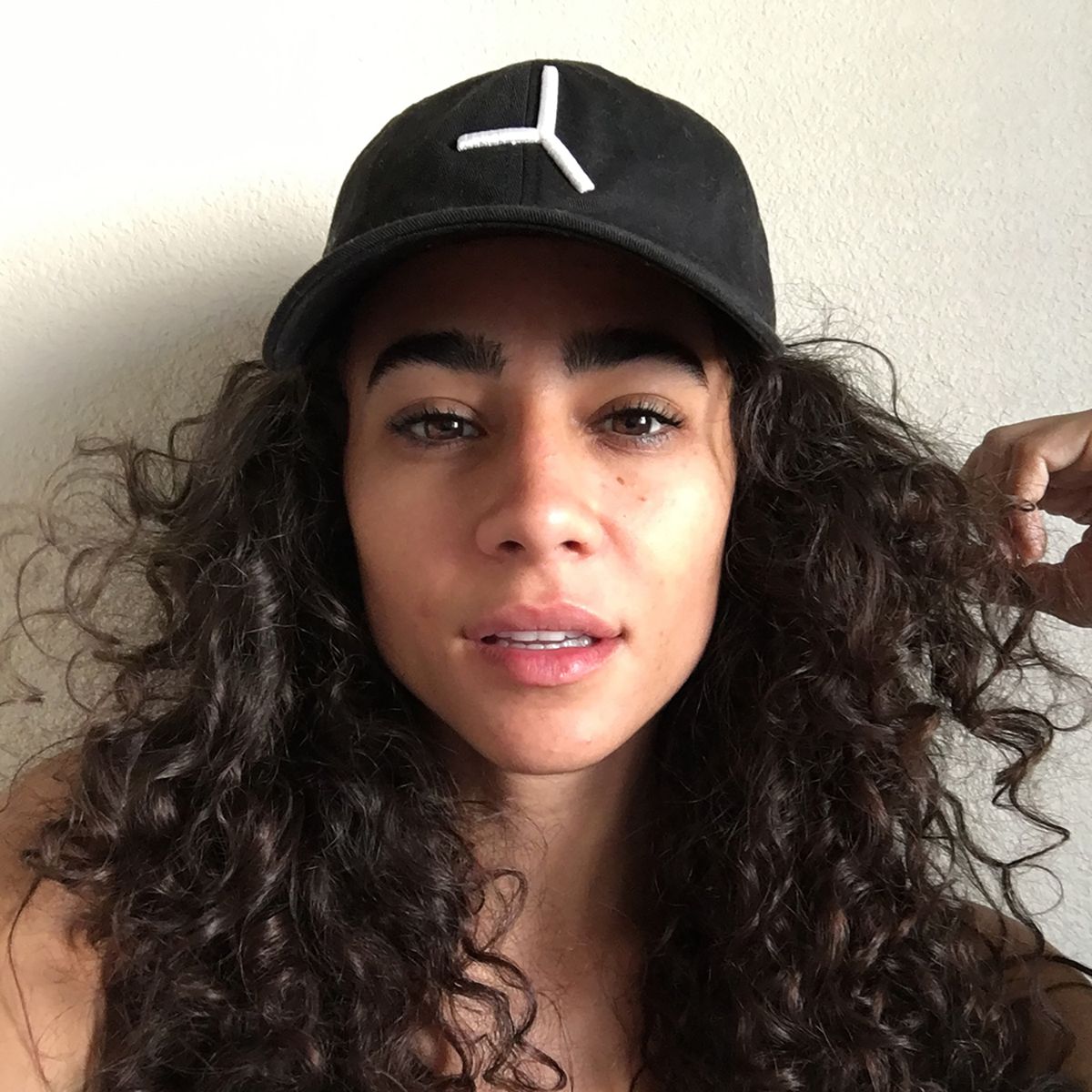 A friend of The Five Nine wearing the cap