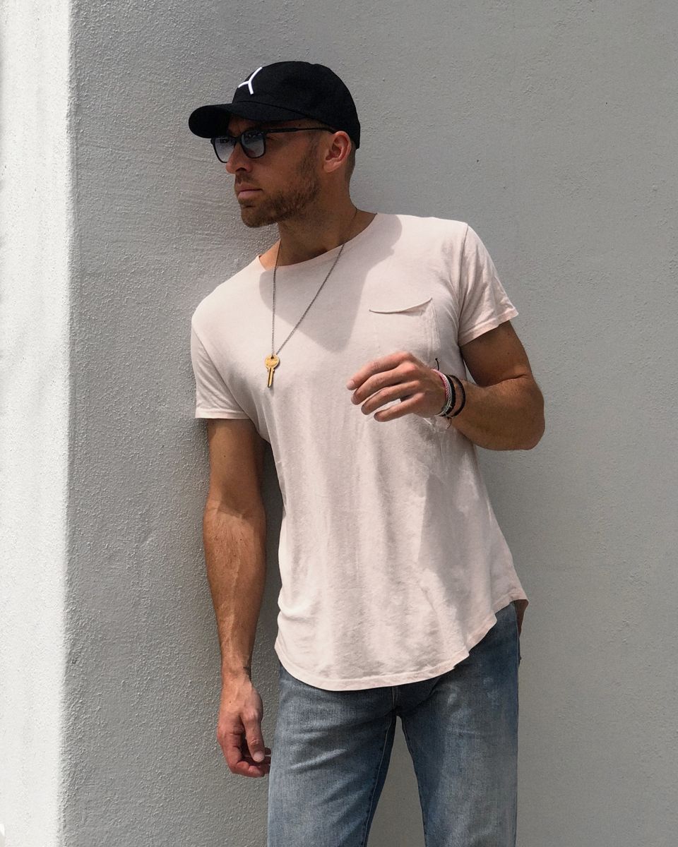 A friend of The Five Nine wearing the cap